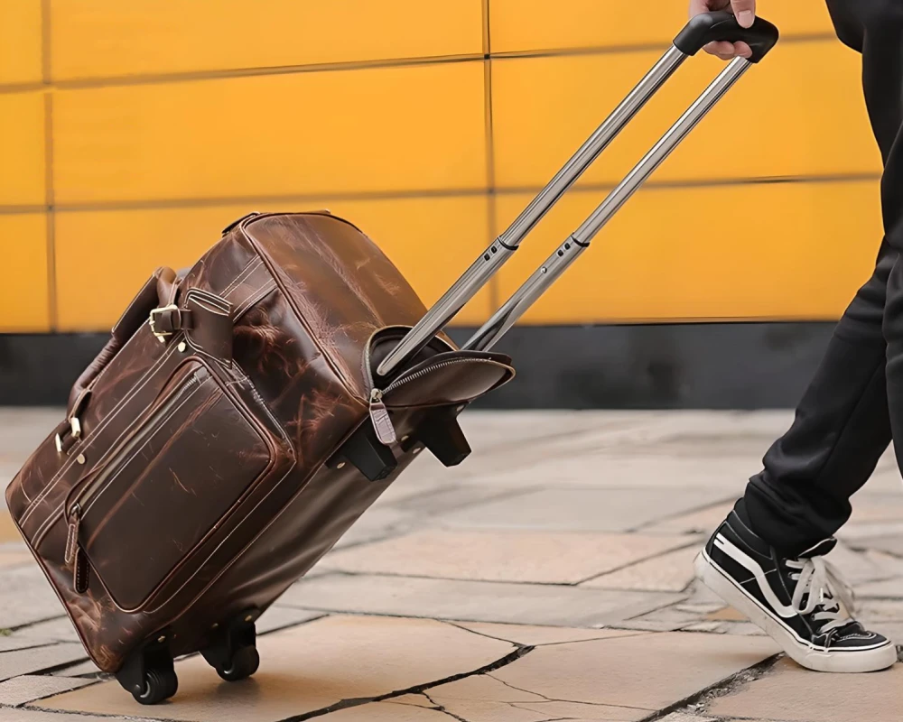 leather luggage on wheels